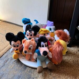 Set of 10 vintage Walt Disney plush figurines.